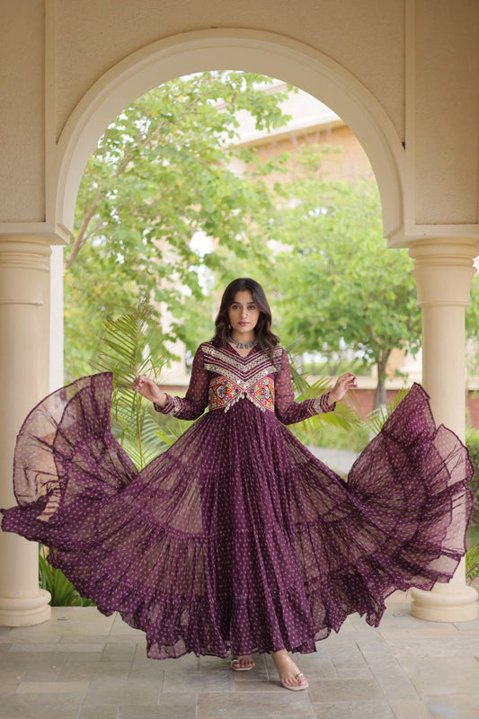 Vibrant Bandhani Printed Faux Georgette Gown with Kutchi Patchwork Yoke & 12-Meter Flair
