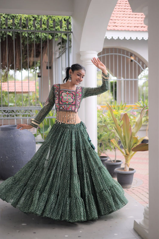 Full Sleeves Bandhani Print Faux Georgette Blouse with Kutchi Patchwork & 12-Meter Flared Lehenga Set