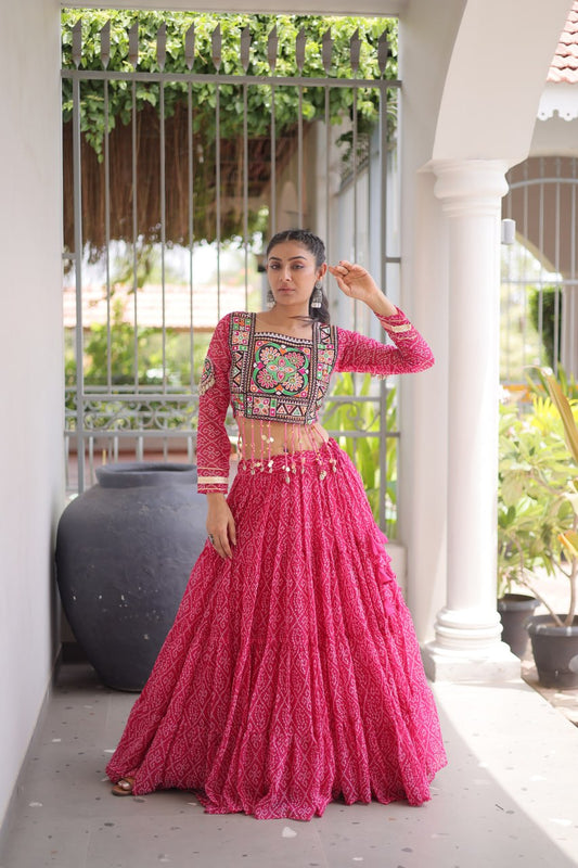 Full Sleeves Bandhani Print Faux Georgette Blouse with Kutchi Patchwork & 12-Meter Flared Lehenga Set