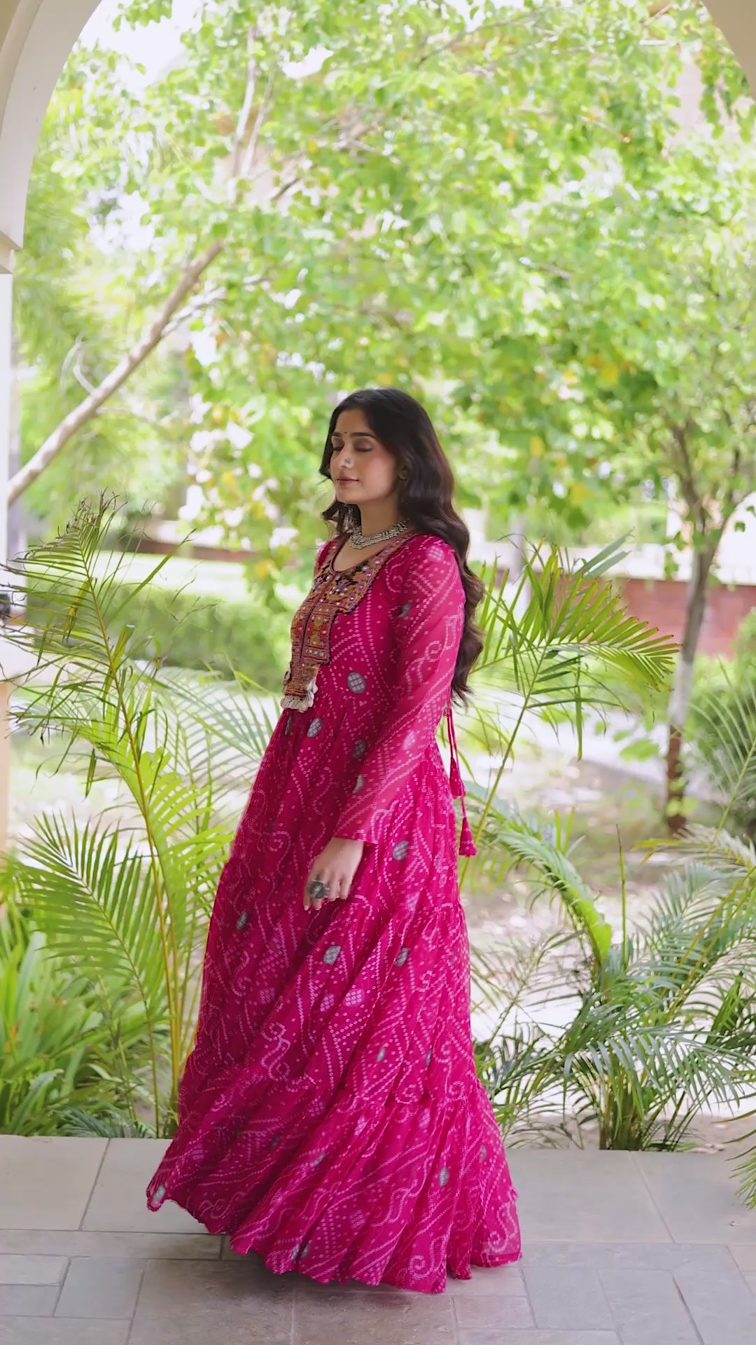 Faux Georgette Bandhani Printed 12-Meter Flared Long Gown with Kutchi Patchwork & Full Sleeves